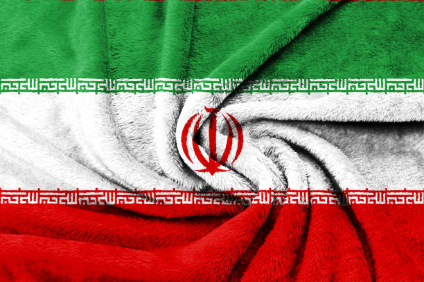 istock Fabric texture of Iran national flag background. 1212476464