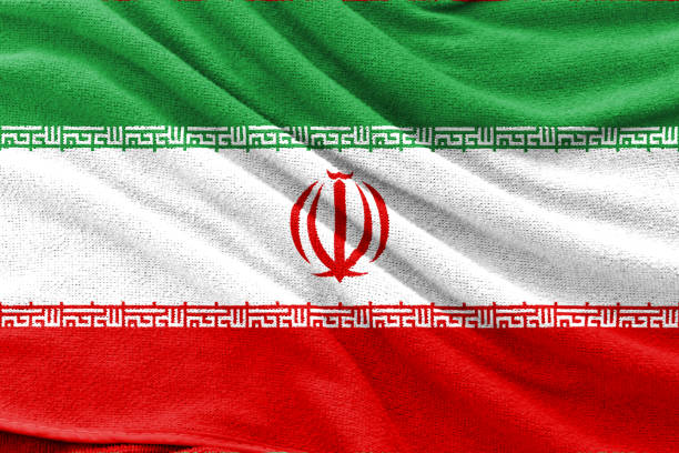 istock Fabric texture of Iran national flag background. 1212476473