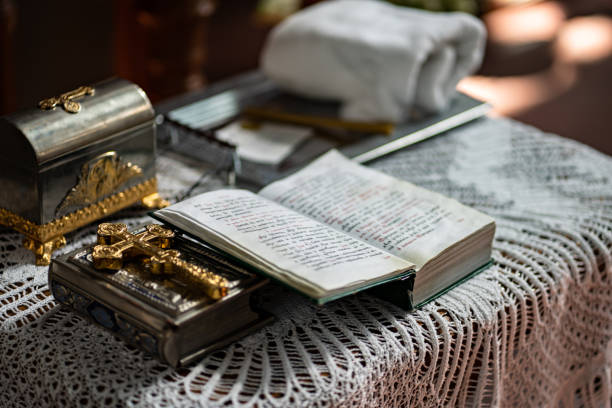 istock Orthodox church prayer book at  wedding or baptism 1212478431