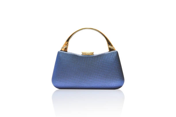 istock blue clutch bag isolated on white background with clipping path. 1212479723