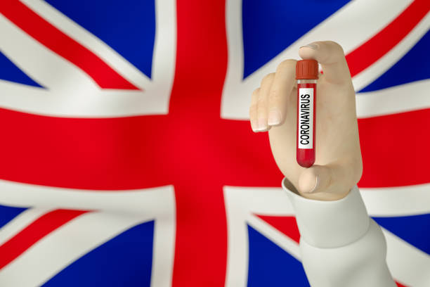 istock Coronavirus Test Tube in Doctor's Hand, British Flag 1212479802