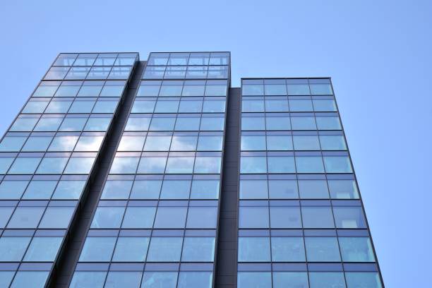 istock Modern office building detail, glass surface with sunlight 1212481350