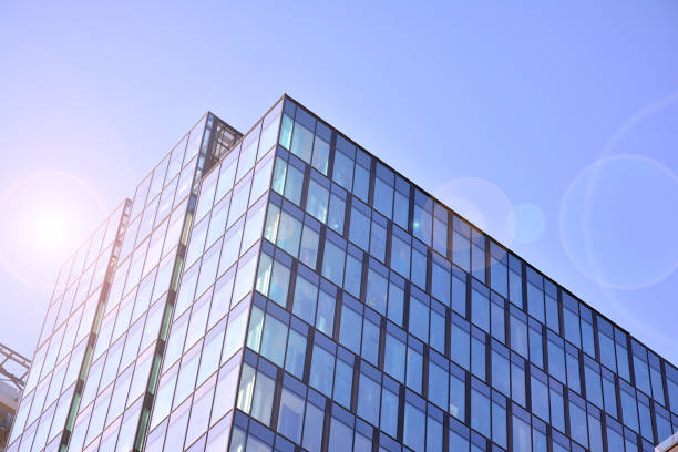 istock Modern office building detail, glass surface with sunlight. 1212481672