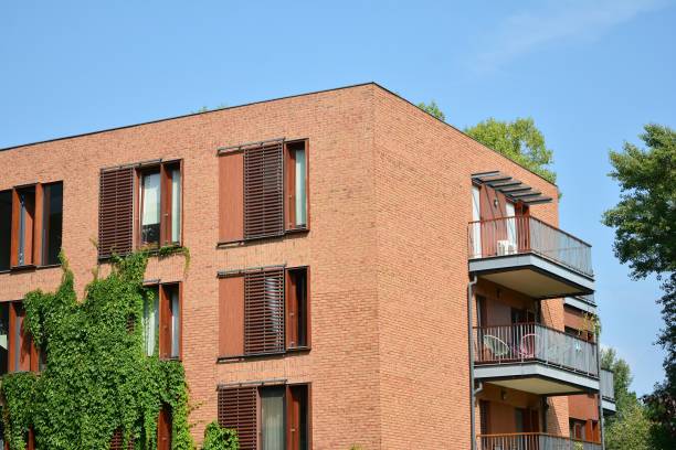 istock Modern apartment buildings on a sunny day with a blue sky. 1212482456