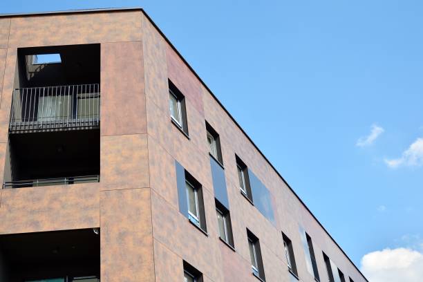 istock Modern apartment buildings on a sunny day with a blue sky. 1212482476