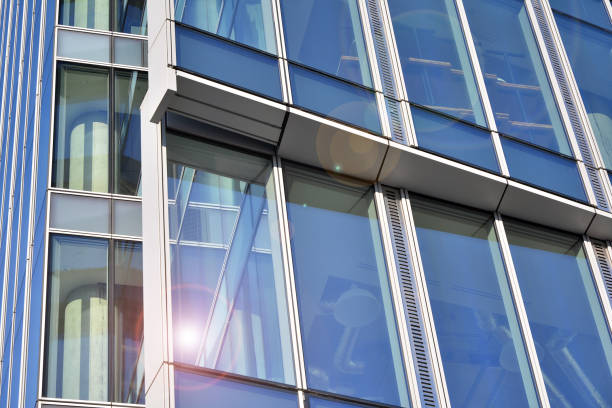 istock Modern office building detail, glass surface with sunlight 1212482530
