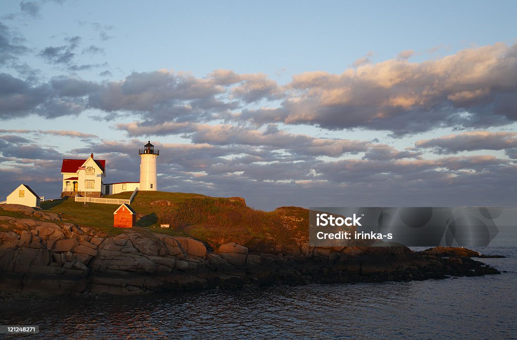 Sunset at Cape Neddick "The Nubble" Lighthouse  Beach Stock Photo