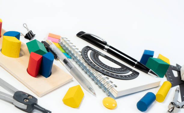 istock Math fractions tools and toys to learn for primary and elementary kids. Mathematics tools for learning basic math. Background presentation. 1212483398