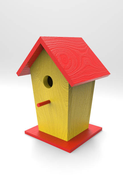 istock Yellow birdhouse with a red roof 1212484331