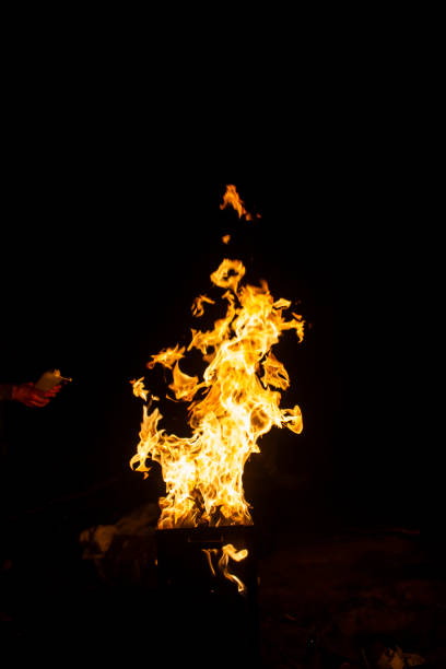 istock Danger fire on a dark background. Background from fire. Fire pattern can be used in design 1212492899