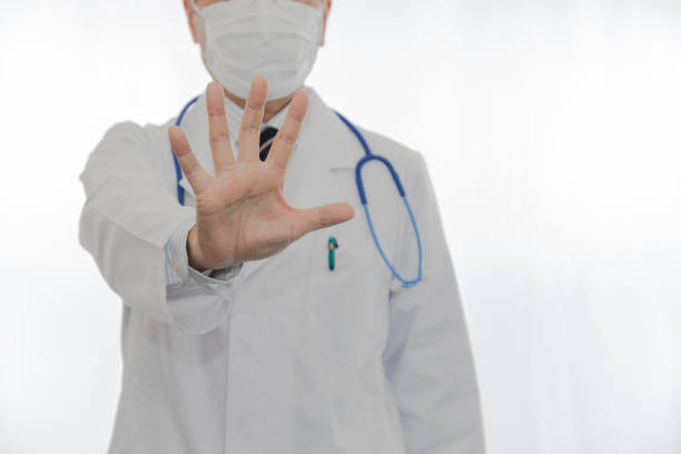 istock Doctor wearing a mask to prevent infection 1212492931
