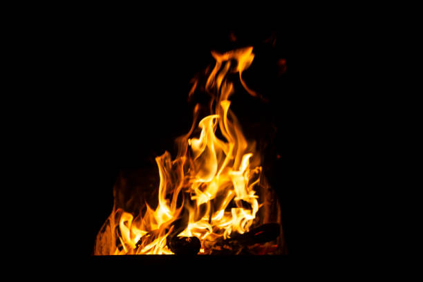 istock Danger fire on a dark background. Background from fire. Fire pattern can be used in design 1212493069
