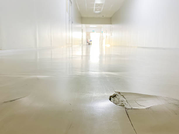 istock cracked floor in factory,dilapidated building,broken corridor 1212497229