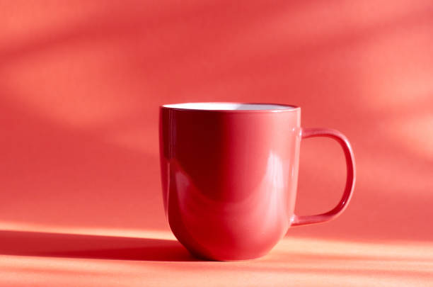 istock Coffee cup on the color background. 1212497495