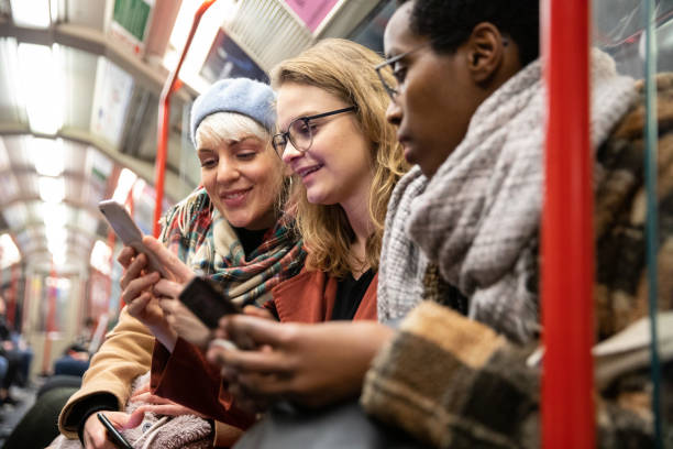 istock Group of multi ethnic friends moving by subway 1212498729