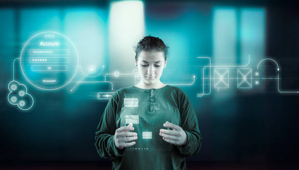 istock Woman working futuristic user interface . High tech screens data and information . 1212498898