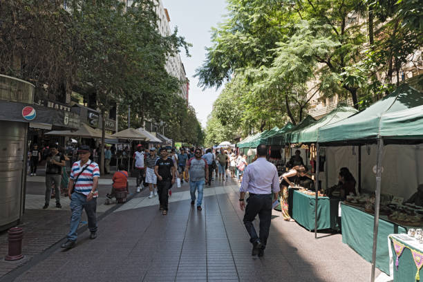 Shoppers and street vendors in a pedestrian area of Santiago, Chile stock photo