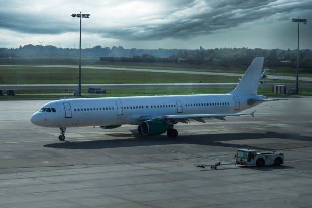 istock Airplane on Airport 1212501961