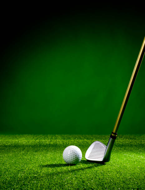 Golf club and golf ball on the turf