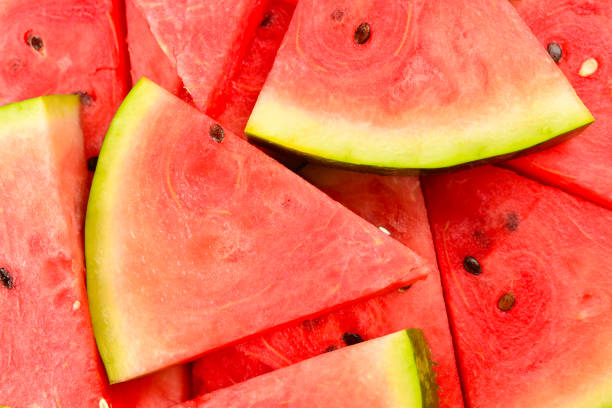 istock Juicy watermelon slices background. Top view. 1212507374