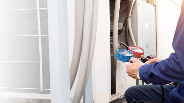 Technician is checking air conditioner ,measuring equipment for filling air conditioners. Technician is checking air conditioner ,measuring equipment for filling air conditioners. pump dress shoe stock pictures, royalty-free photos & images