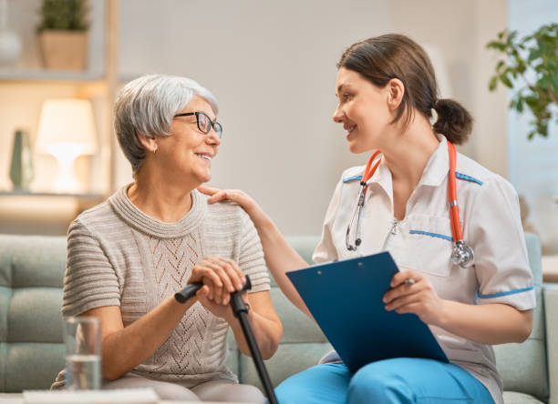 istock Happy patient and caregiver 1212509882