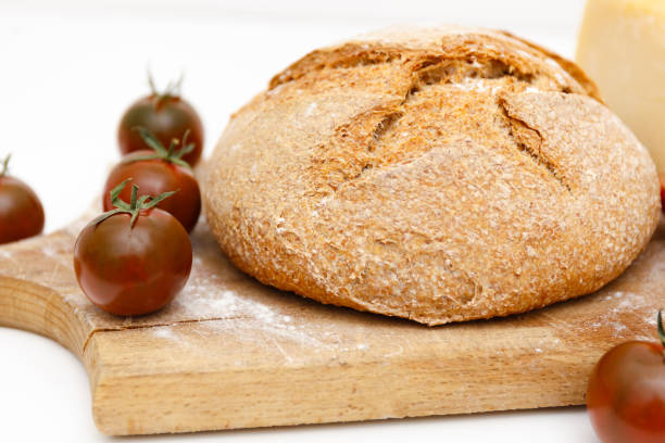 organic nutrition. homemade bread on white background.  healthy homemade dinner. top view. white wood texture background. - wheat pasta flour italy imagens e fotografias de stock