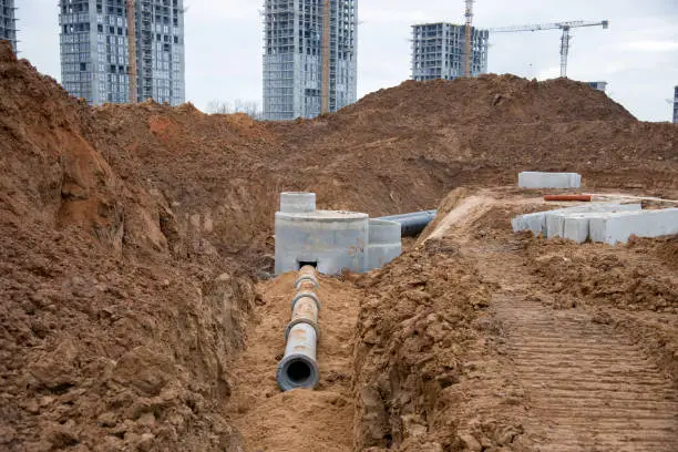 Photo of Laying concrete drain pipes and manholes for stormwater system