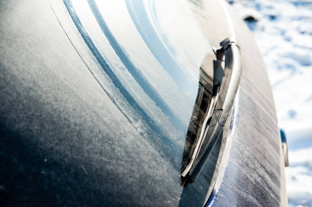 istock Dirty rear car windshield. Old wiper doesn't clean glass well. 1212518640