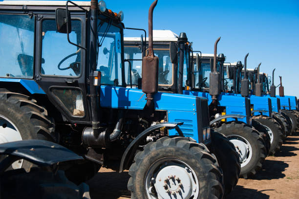 Tractor plowing fields - preparing land for sowing