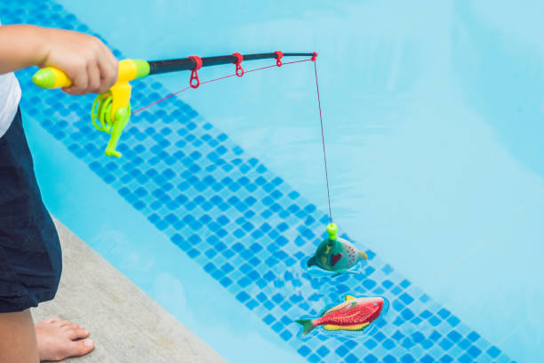 1,300+ Toy Fishing Rod Stock Photos, Pictures & Royalty-Free