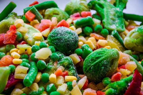 istock Selective focus Background from different frozen vegetables, Vegetarian food vegetables, brussels sprouts 1212528124