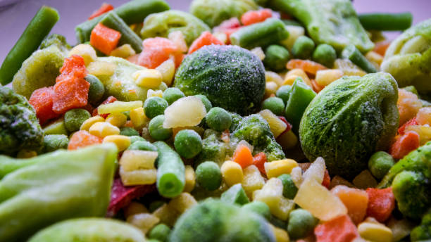 istock Selective focus Background from different frozen vegetables, Vegetarian food vegetables, brussels sprouts 1212528169