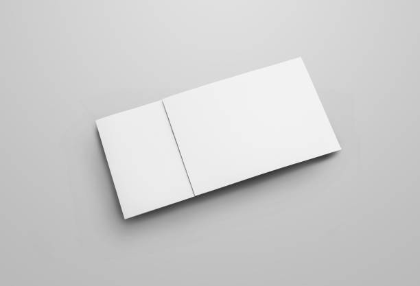 istock Mockup of paper horizontal bifold isolated on gray background. 1212532882