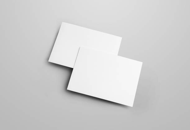 istock Business folding bifold template isolated on gray background, with realistic shadows. 1212532922