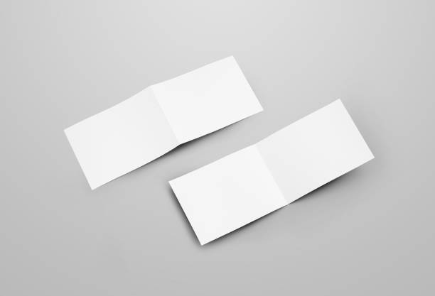 istock White blank booklet template for presentation design. Horizontal open bifold mockup isolated on gray background. 1212532928