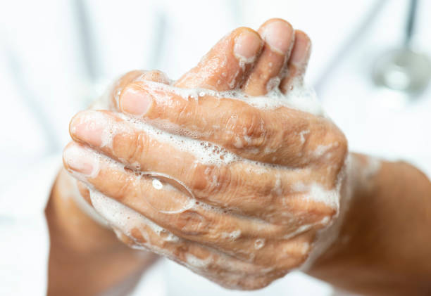 istock Doctor Washing His Hands 1212535210