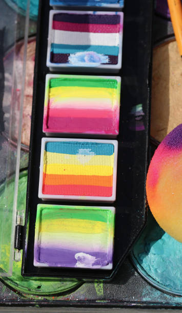 istock Palettes with different greasepaintes of colors 1212535303