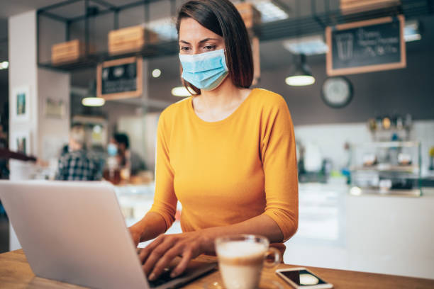 istock Woman with face protective mask 1212536045
