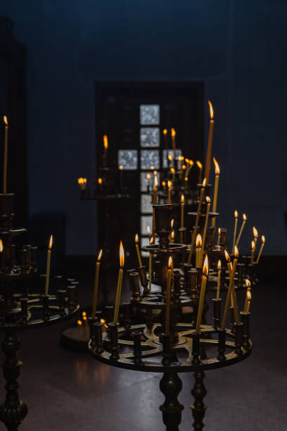 istock Burning candles in Orthodox church 1212536614