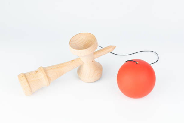 Kendama on white background Kendama(Cup-and-ball Toy) is a traditional japanese wood toy kendama traditional japanese toy stock pictures, royalty-free photos & images