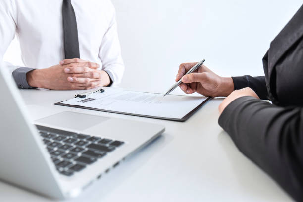 istock Businessman interview consider a resume conversation during about profile of candidate of conducting a job interview listen to answers while sitting at the working meeting in office 1212542069