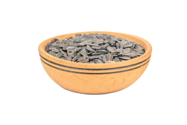 istock Sunflower seeds in bowl 1212546012