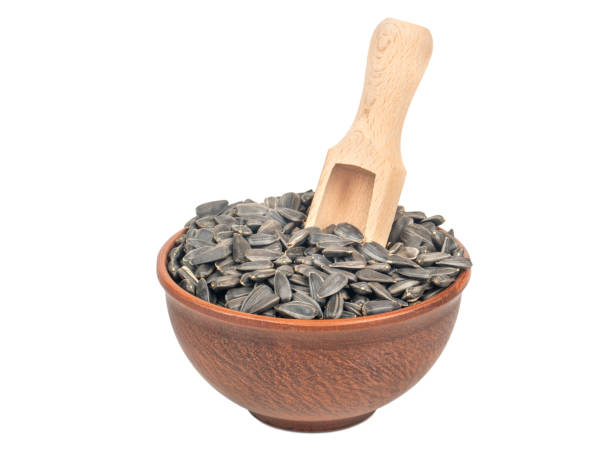 istock Sunflower seeds in bowl 1212546015