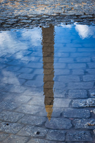 istock Puddle of rain in Paris 1212547095