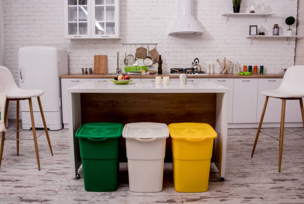 Recycle bins in the kitchen. Household waste sorting.