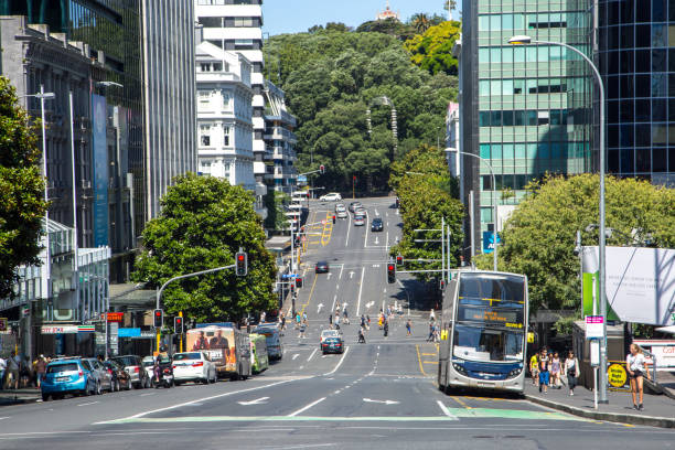 New Zealand: Auckland Traffic moves along Victoria Street West near Albert Park in central Auckland. albert park photos stock pictures, royalty-free photos & images