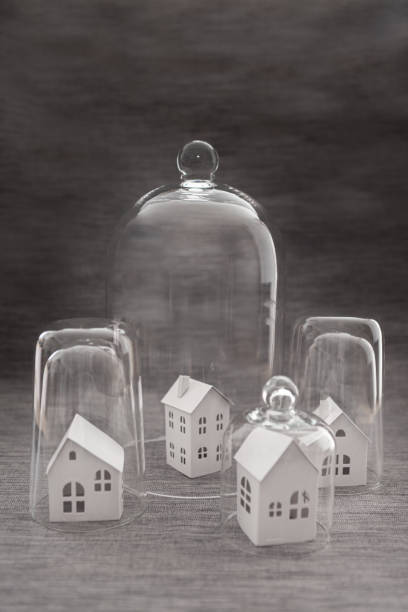 istock Little house in bell jar 1212553328