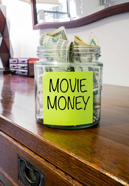 istock Saving money for movie 1212553524