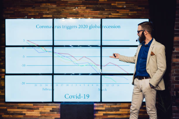 istock Financial analyst giving presentation about global recession 1212556017